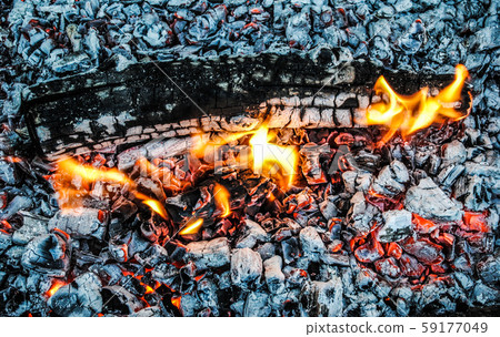 Burning logs and embers in the fire Burning logs and embers in the fire 59177049