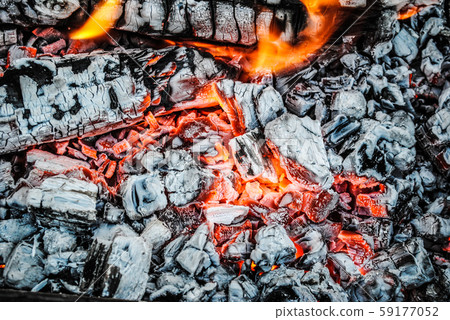 Burning logs and embers in the fire Burning logs and embers in the fire 59177052