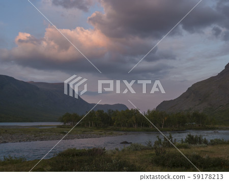 Confluence of wild Tjaktjajakka river and Confluence of wild Tjaktjajakka river and 59178213