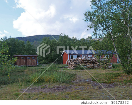 red building of AbiskoJaure STF mountain hut. 59178222