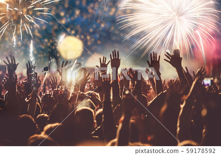 cheering crowd watching fireworks - new year 59178592