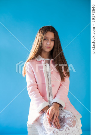 Portrait of a beautiful fashionable girl in a pink and a white dress 59178646