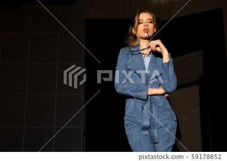 portrait of a beautiful business woman in a business suit at work in the office portrait of a beautiful business woman in a business suit at work in the office 59178652