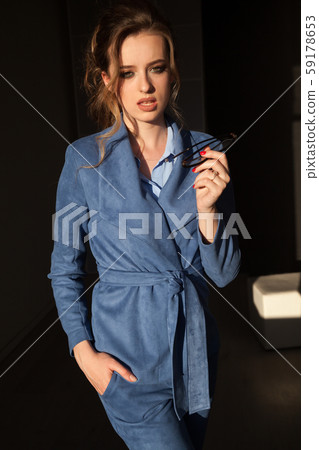 portrait of a beautiful business woman in a business suit at work in the office portrait of a beautiful business woman in a business suit at work in the office 59178653