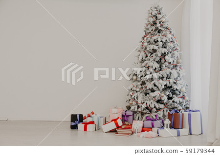 Christmas tree with presents, Garland lights new year 59179344
