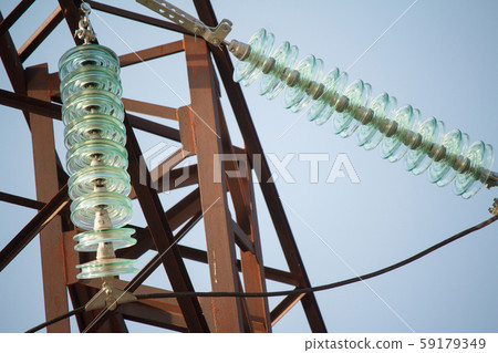 Close-up bottom view of insulators on high-voltage Close-up bottom view of insulators on high-voltage 59179349