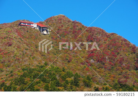 Autumn leaves and ropeway of Unzen Nita Pass 59180215