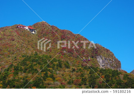 Autumn leaves and ropeway of Unzen Nita Pass 59180216