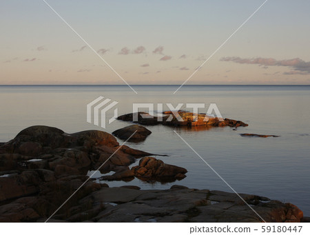 Sunset scene at the shore of Lake Vanern.  59180447