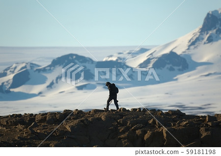 Walking on a wild landscape in Iceland Walking on a wild landscape in Iceland 59181198