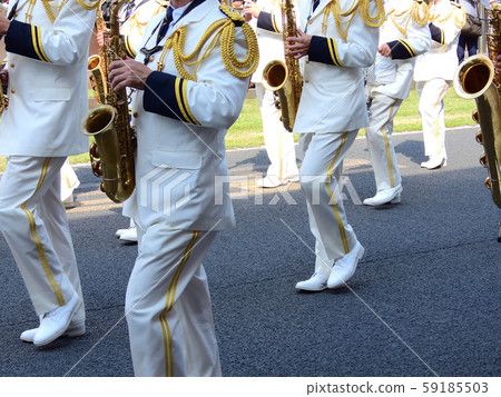Parade performance corps marching with musical instruments 59185503