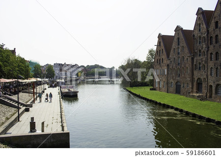 Salzspeicher and Trave Canal seen from the Holsten Bridge in Lübeck, Germany Salzspeicher and Trave Canal seen from the Holsten Bridge in Lübeck, Germany 59186601