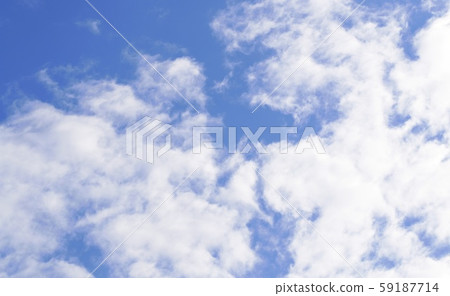 blue sky with beautiful soft white clouds in sunny weather. Outdoor nature landscape background concept - image 59187714