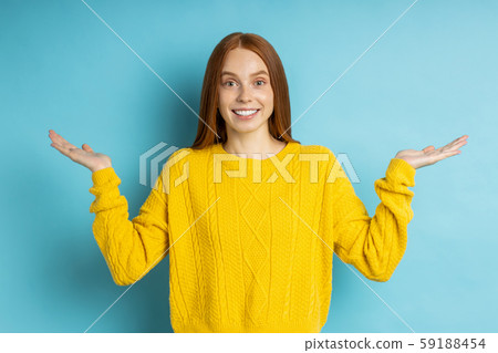 Happy redhead girl smiling looking at camera Happy redhead girl smiling looking at camera 59188454