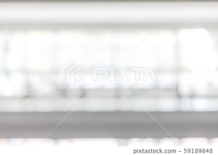 Blur business office background interior view empty lobby corridor hallway with glass wall white room and light bokeh Blur business office background interior view empty lobby corridor hallway with glass wall white room and light bokeh 59189848