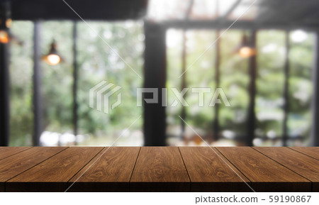 Wood table in blur background of modern restaurant 59190867