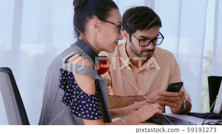 Creative business people having group conversation Creative business people having group conversation 59191273