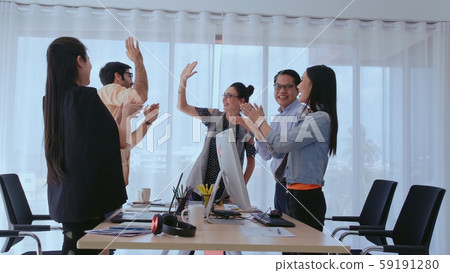 Successful business people celebrating success. Successful business people celebrating success. 59191280
