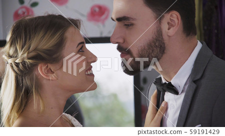 Bride and groom in wedding dress prepare ceremony. 59191429