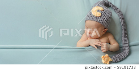 Adorable newborn baby sleeping in cozy room. Adorable newborn baby sleeping in cozy room. 59191738