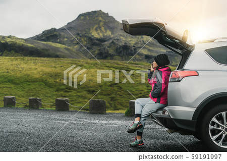 Woman tourist travel by SUV car in Iceland. 59191997