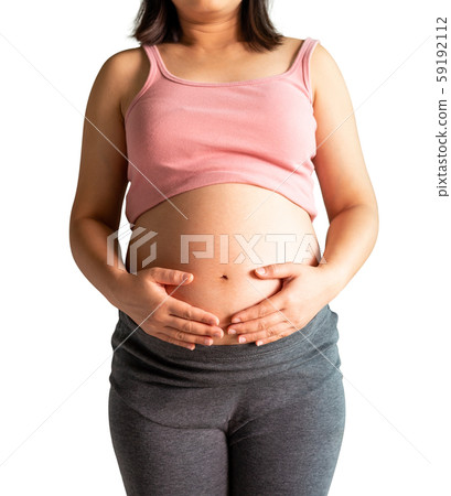 Happy pregnant woman isolated on white background. Happy pregnant woman isolated on white background. 59192112