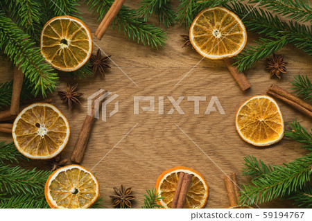 Flat lay christmas composition with spruce branches and natural decorations on aok wood surface and 59194767