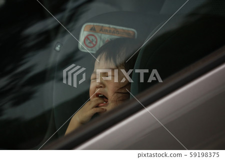 Baby crying in the car Baby crying in the car 59198375