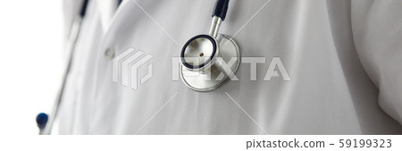 Stethoscope head lying at GP chest wearing white coat Stethoscope head lying at GP chest wearing white coat 59199323