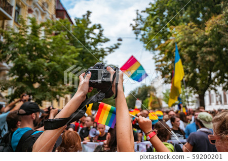 Correspondent takes photo during the Gay Pride parade 59200201