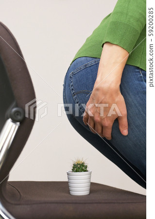 Woman Suffering From Hemorrhoids 59200285