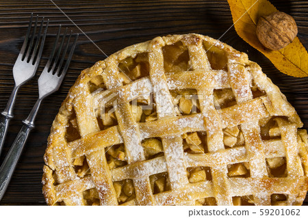 Homemade American Apple Pie Decorated with fresh apples and autumn leaves Homemade American Apple Pie Decorated with fresh apples and autumn leaves 59201062