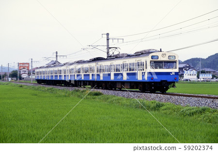 1996 103 Series Rapid Umikaze 4 running on the Sengoku Line 59202374