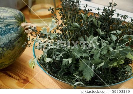 bunch of greens close-up in a glass bowl bunch of greens close-up in a glass bowl 59203389