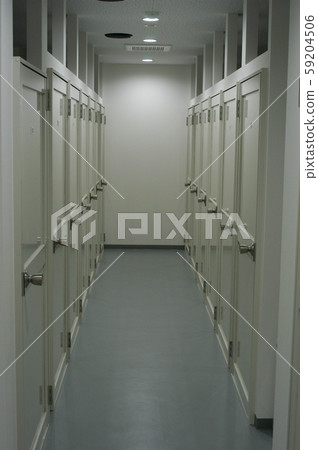 Indoor trunk room corridor and door row Indoor trunk room corridor and door row 59204506