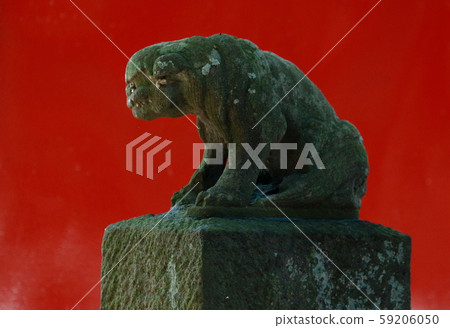 Stone guardian dog with red background Stone guardian dog with red background 59206050