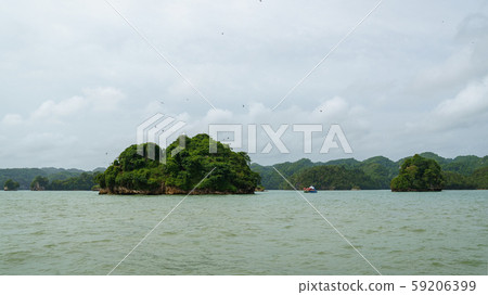 Ship and tourist at Los Haitises National Park Ship and tourist at Los Haitises National Park 59206399