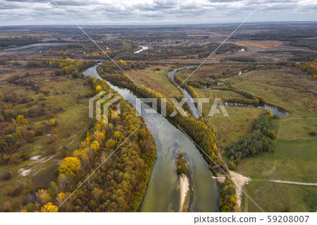Aerial view of the Seym River at Baturyn in Ukraine. Beautiful autumn river landscape. Aerial view of the Seym River at Baturyn in Ukraine. Beautiful autumn river landscape. 59208007
