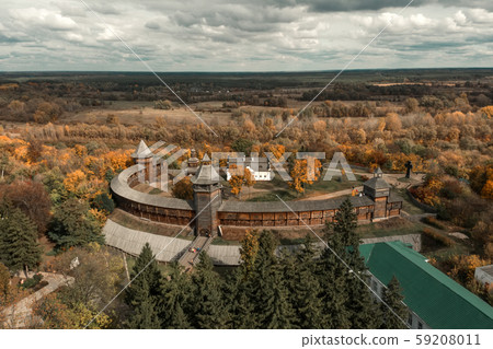 Aerial view of Baturin Castle with the Seym River in Chernihiv Oblast of Ukraine. Beautiful autumn Aerial view of Baturin Castle with the Seym River in Chernihiv Oblast of Ukraine. Beautiful autumn 59208011