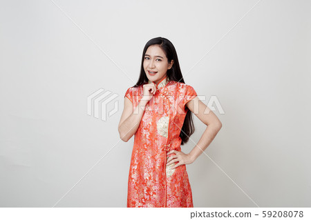 Asian woman wear cheongsam in chinese new year 59208078