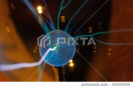 Hand touching a plasma ball with smooth 59209599