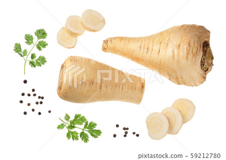 Parsnip root and slices with parsley peppercorns isolated on white background closeup. Top view 59212780