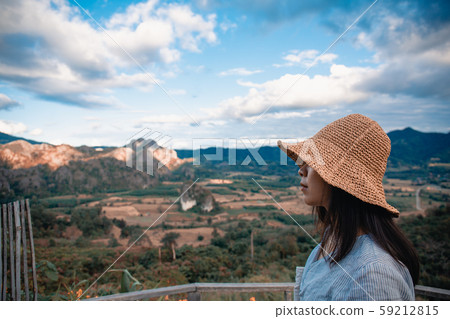 Woman standing on Phu Lang Ka, Phayao in Thailand 59212815
