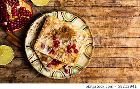 Homemade waffles pomegranate fruit 59212941