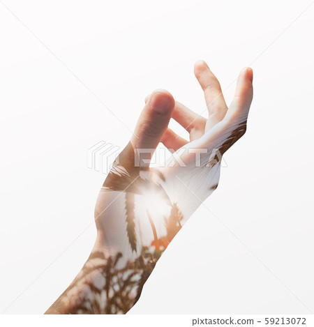 Conceptual image of male hand with double exposure effects 59213072
