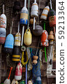 Hanging lobster nautical buoys on the wall 59213364