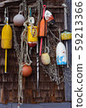 Lobster buoys with fishing nets 59213366