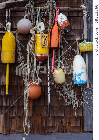 Lobster buoys with fishing nets 59213366
