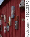 Red boat house wall in Rockport harbor 59213370