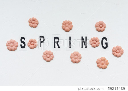 SPRING word and flower cookies on a white background. Spring cooking concept. 59213489